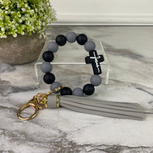 Load image into Gallery viewer, Silicone Bracelet Keychain - Jesus, Black &amp; Gray
