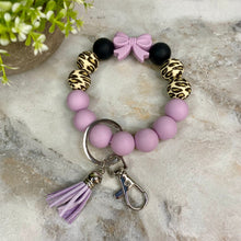 Load image into Gallery viewer, Silicone Bracelet Keychain - Purple Bow
